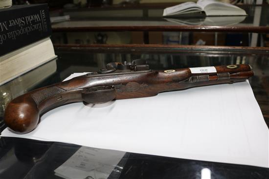 An Edwards flintlock pistol and two replicas